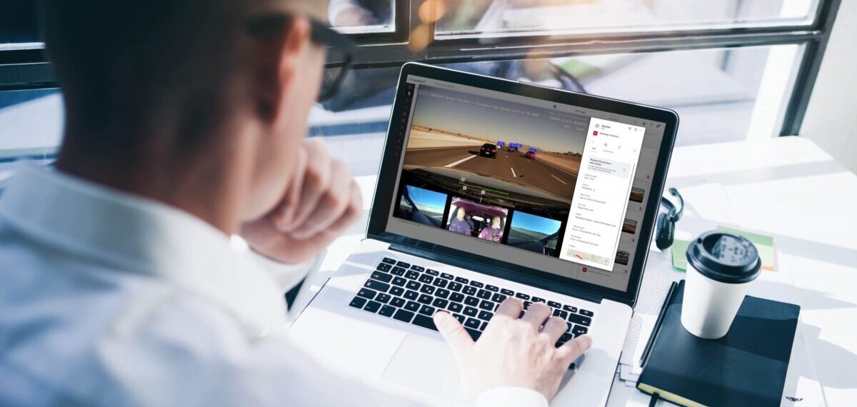 Fleet manager reviewing video